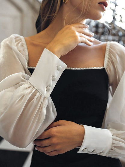 Elegantes schulterfreies Midikleid mit transparenten Ärmeln